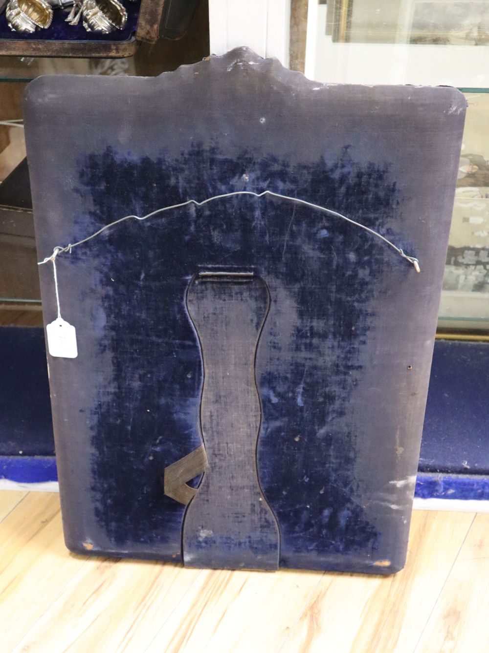 A large Edwardian repousse silver mounted easel frame toilet mirror, Henry Matthews, Birmingham, 1904, 72.8cm.